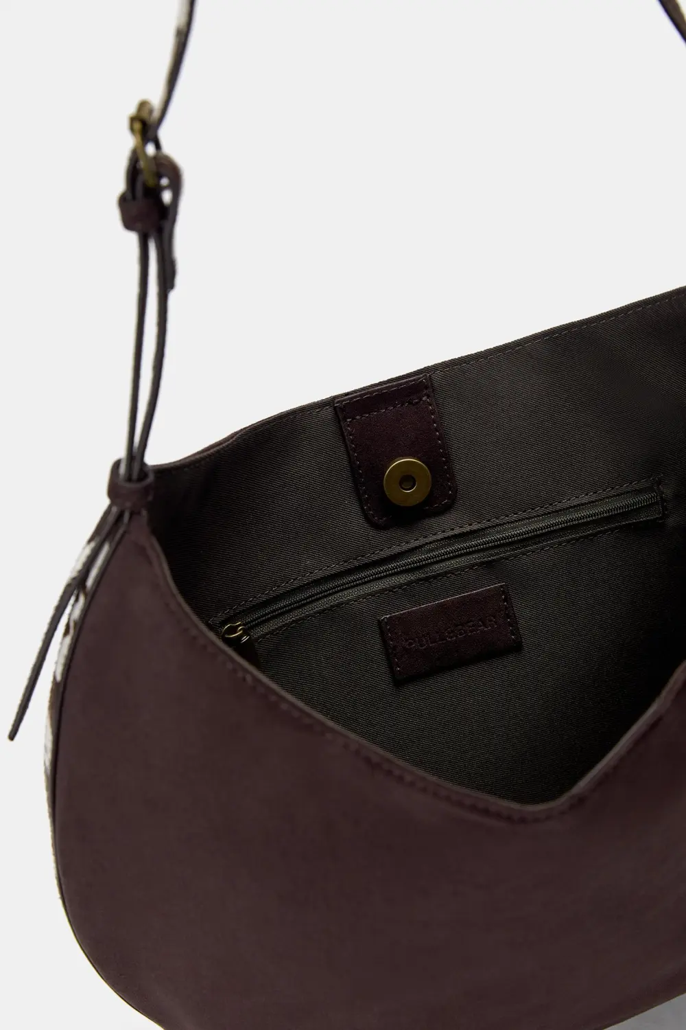 Bolso de hombro detalle animal print