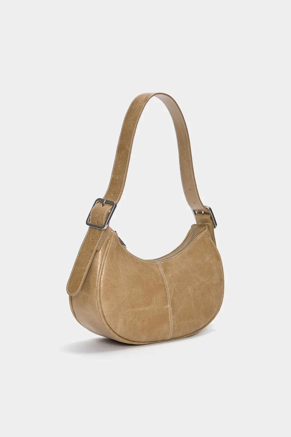 Bolso de hombro desgastado