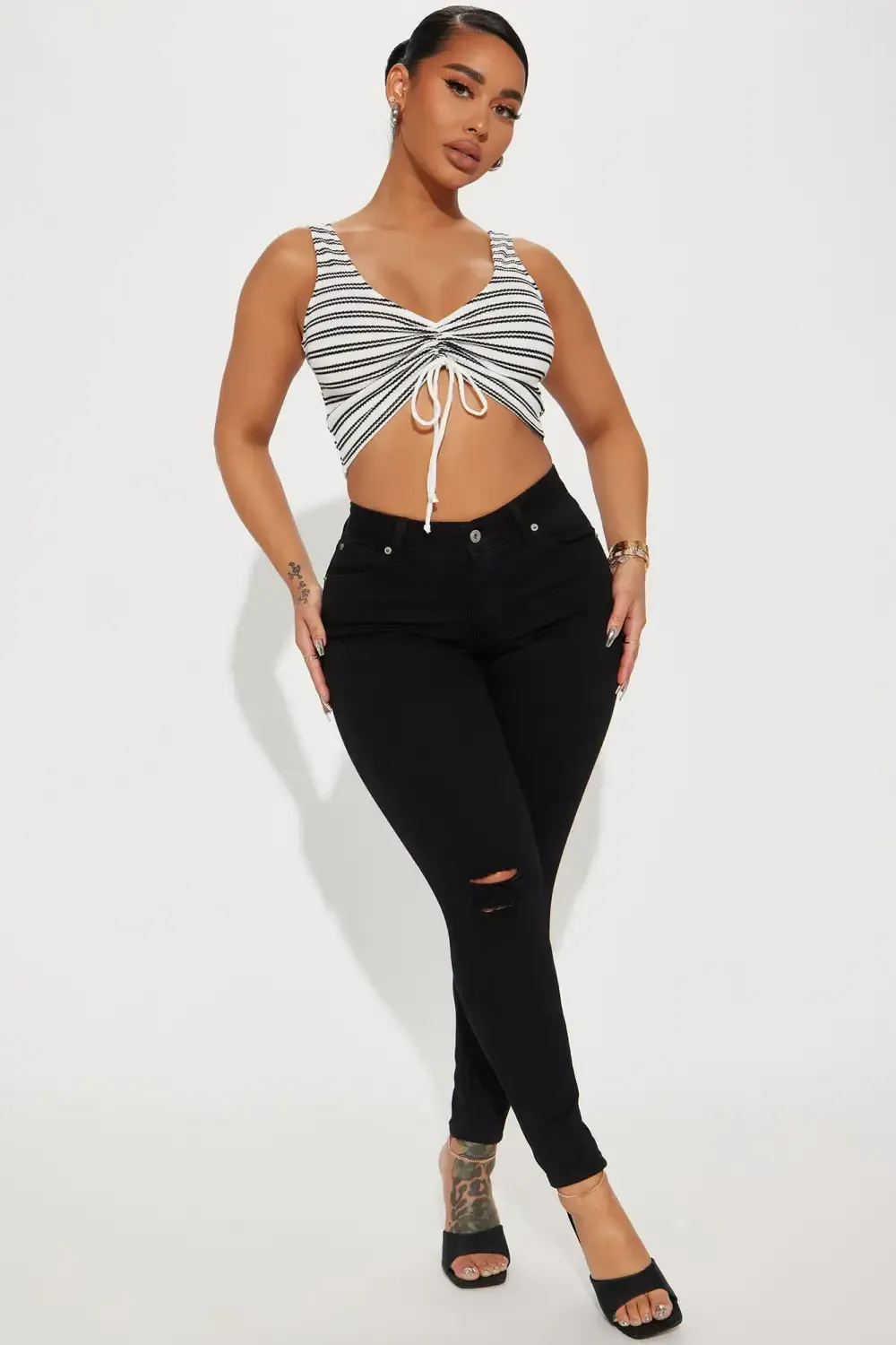 Caviar Mid Rise Ripped Ankle Skinny Jean - Black