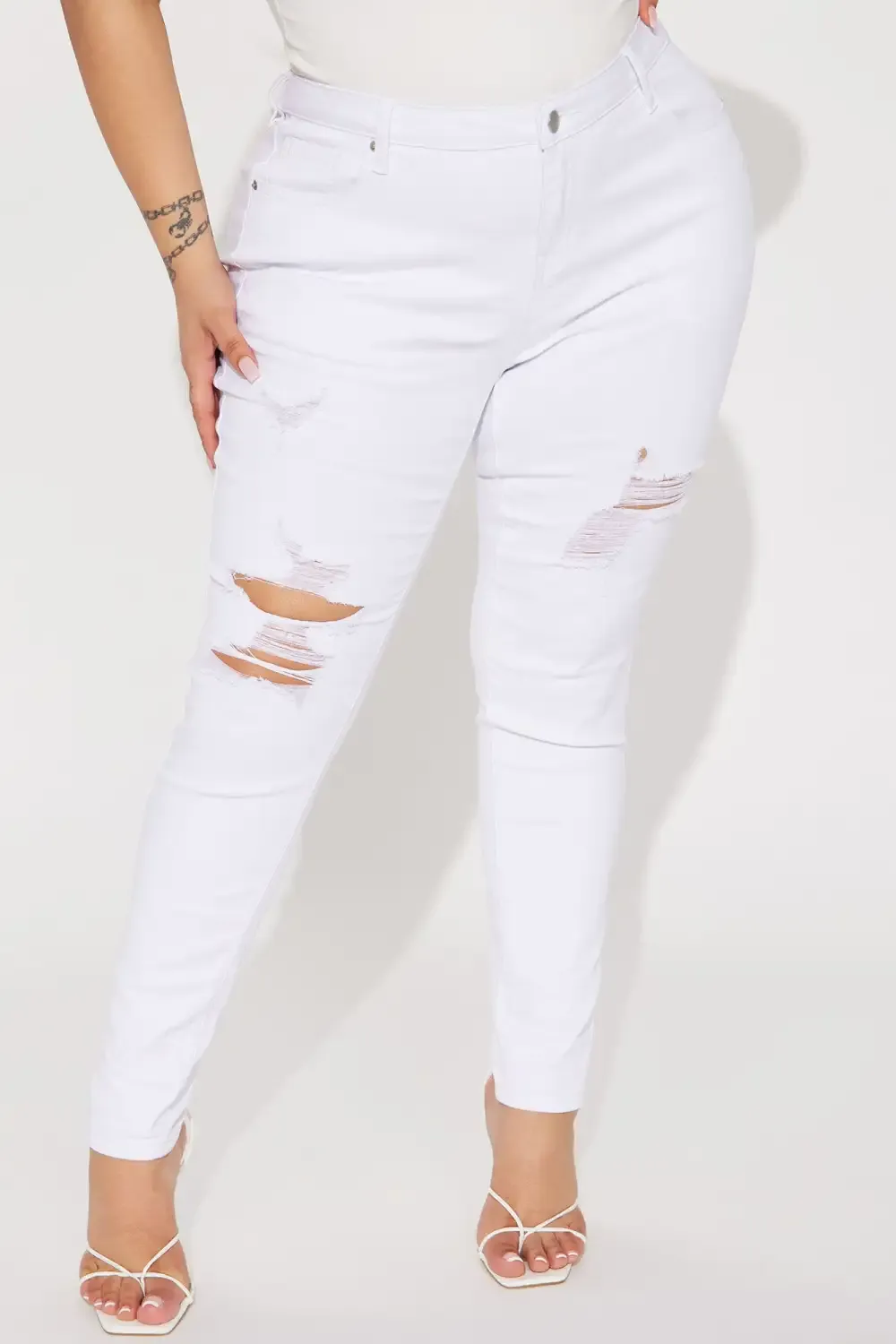 Raven Ripped  Mid Rise Stretch Skinny Jeans - White
