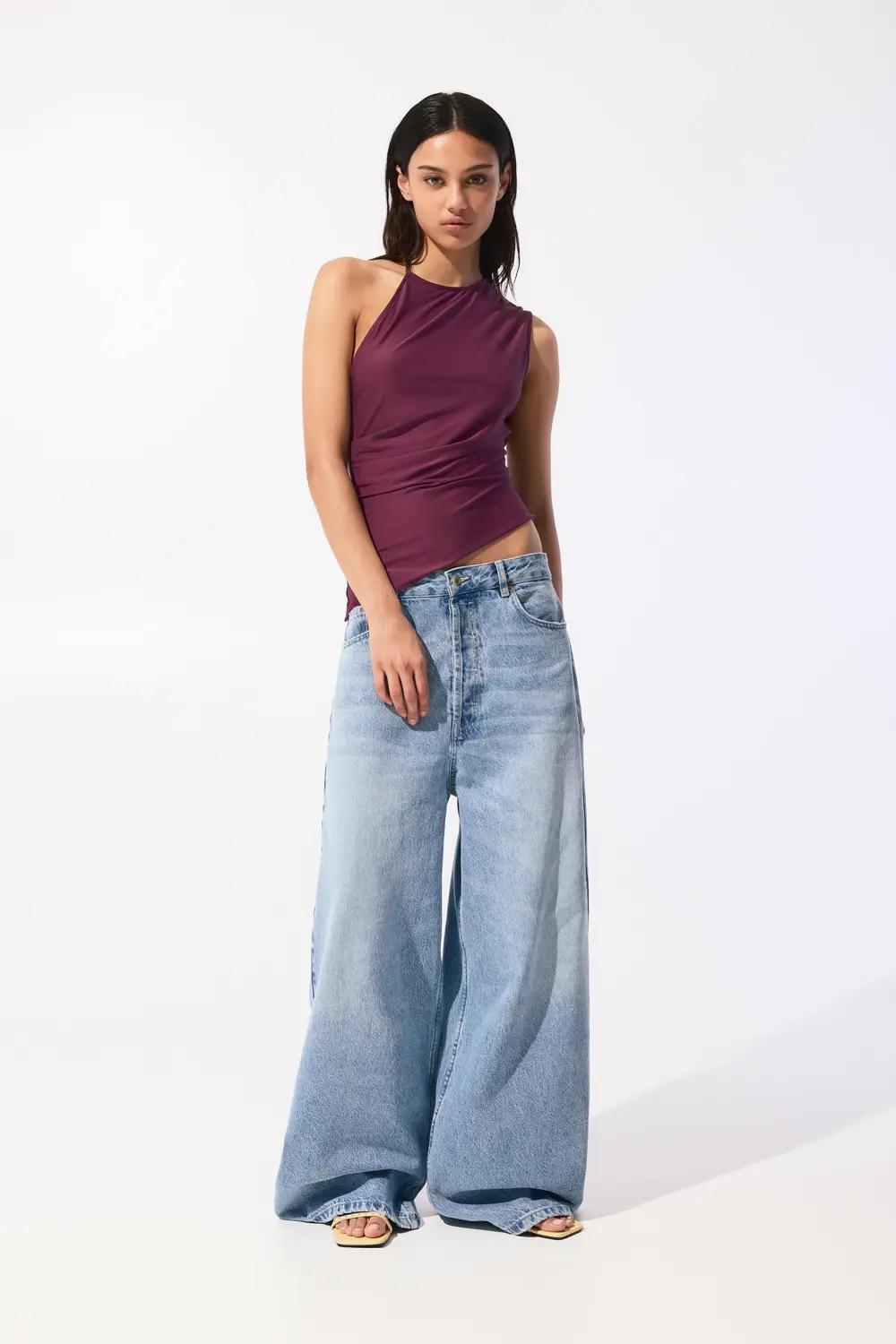 Asymmetric top with strap