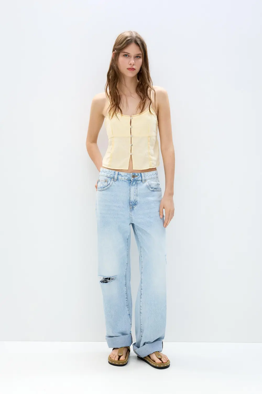 Lace-trimmed top with straps