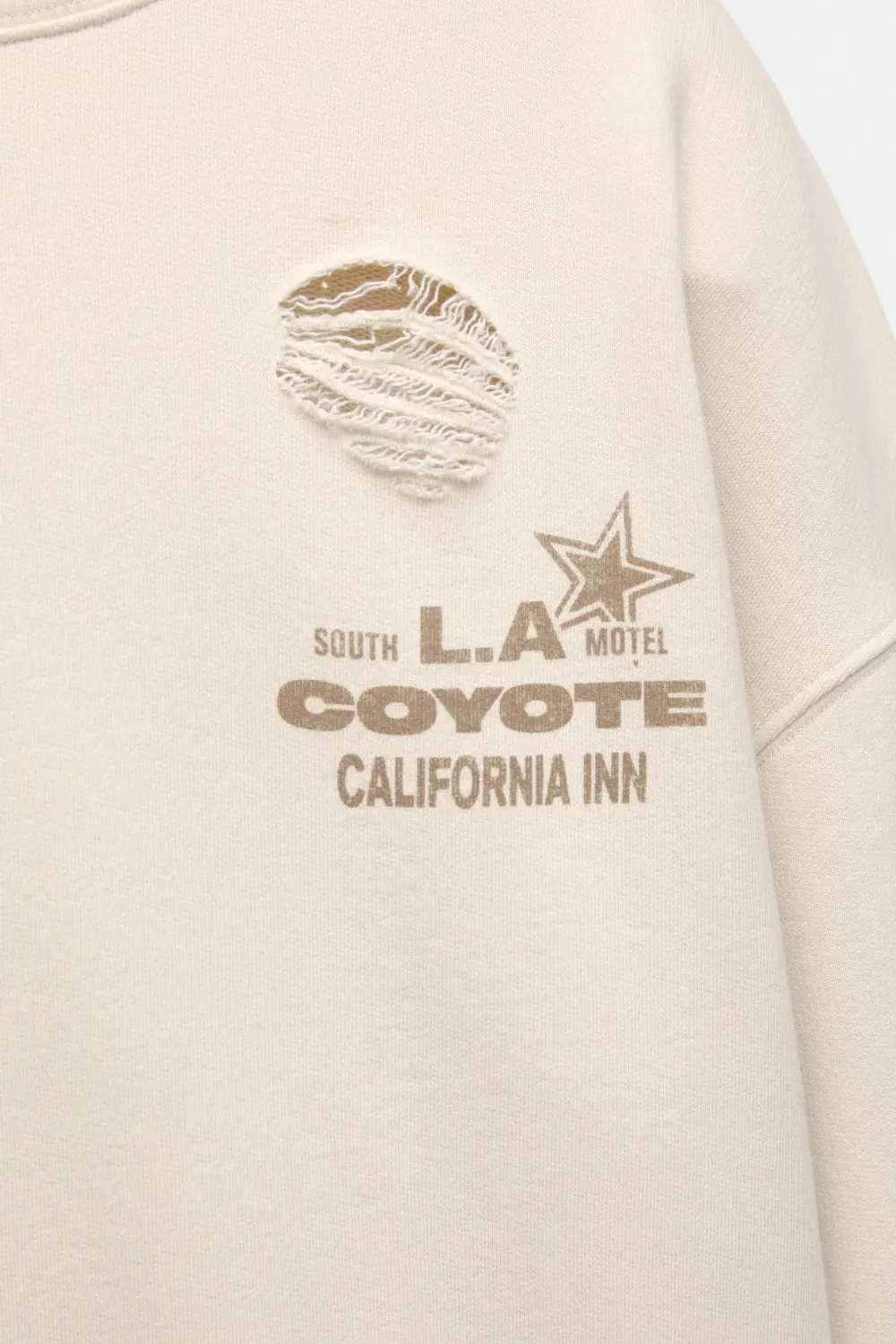Sudadera motel detalle rotos