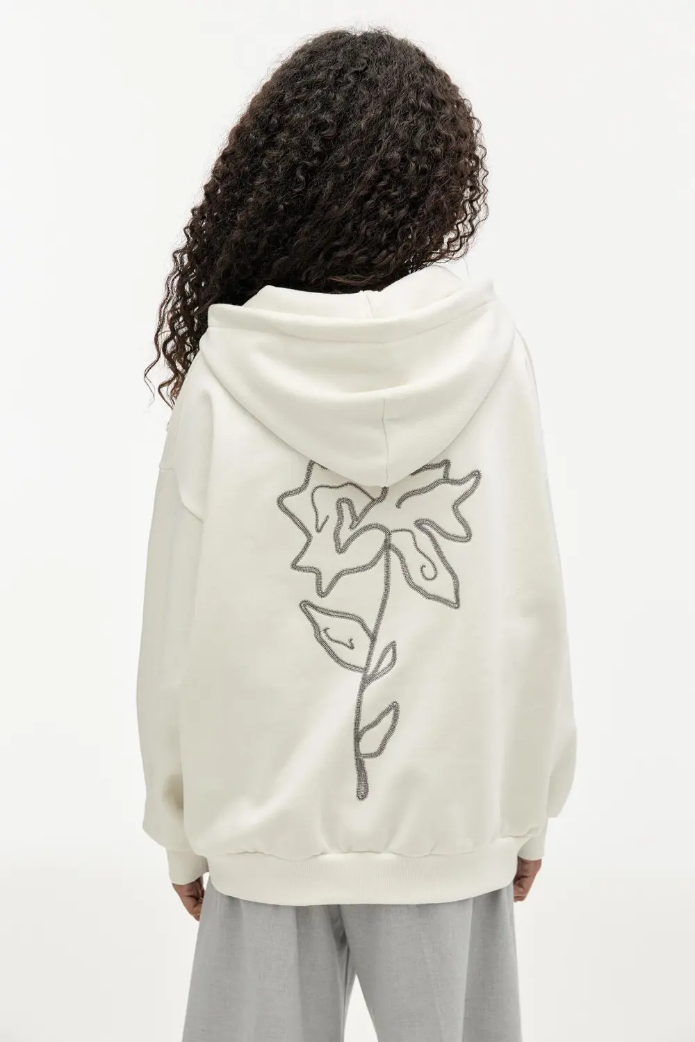 Sudadera capucha cremallera flor