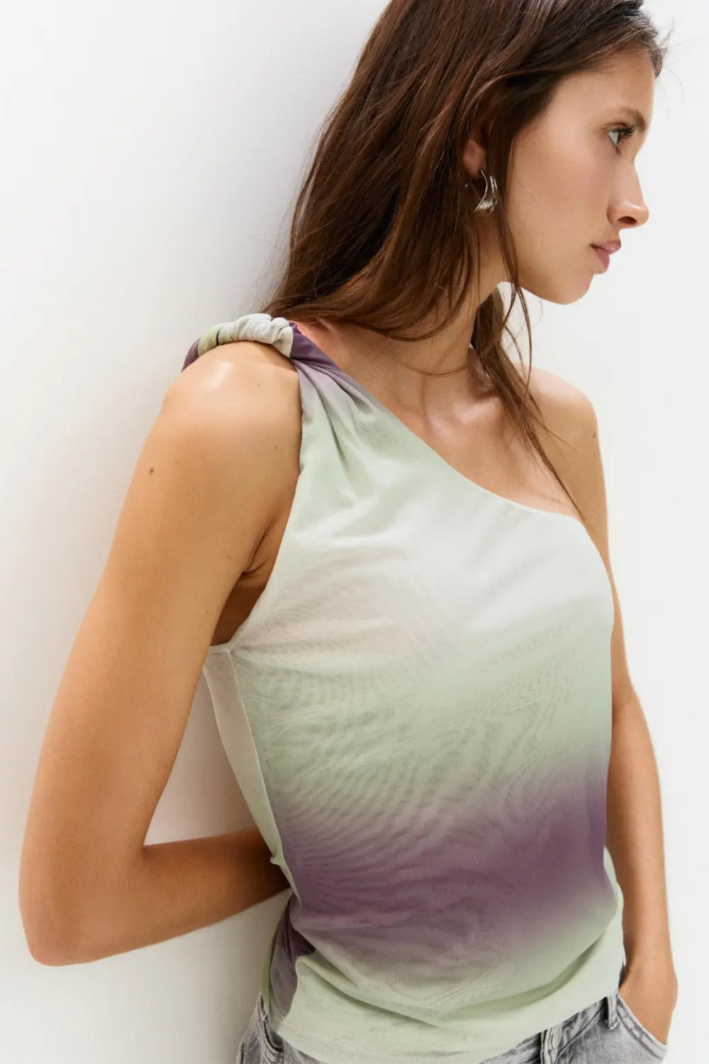 Asymmetric tulle top with a knotted strap