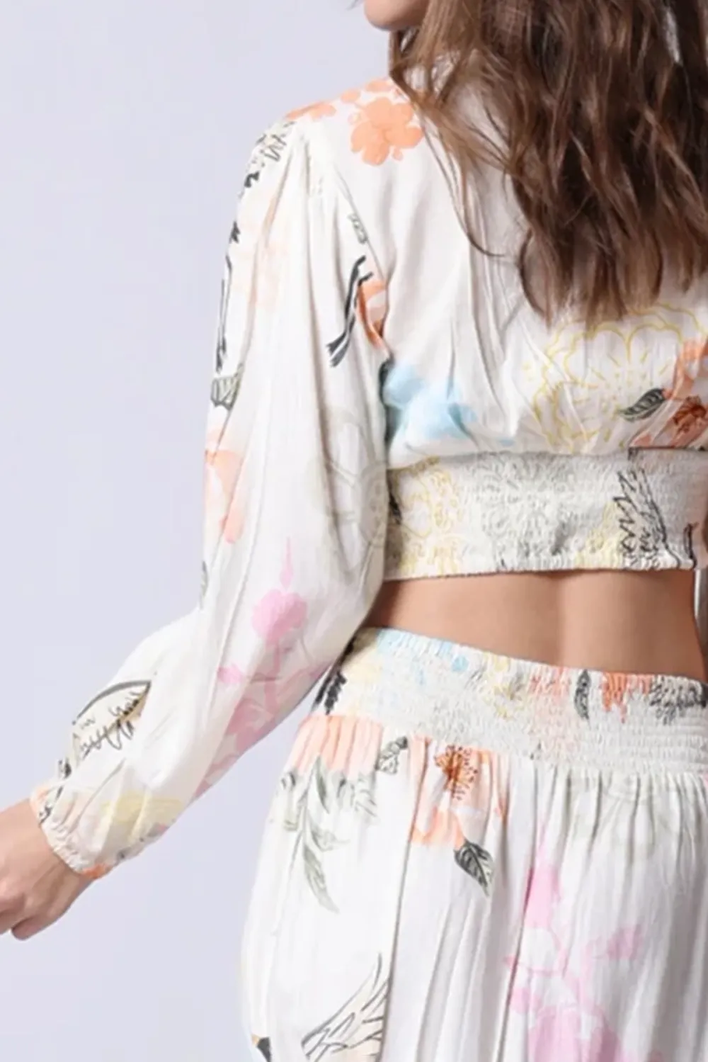 White And Multicolor Floral Print Crop Top And Asymmetrical Skirt Set