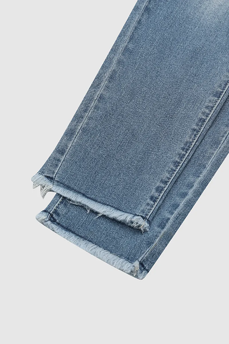 Cut Out Raw Hem Mid Rise Skinny Jeans