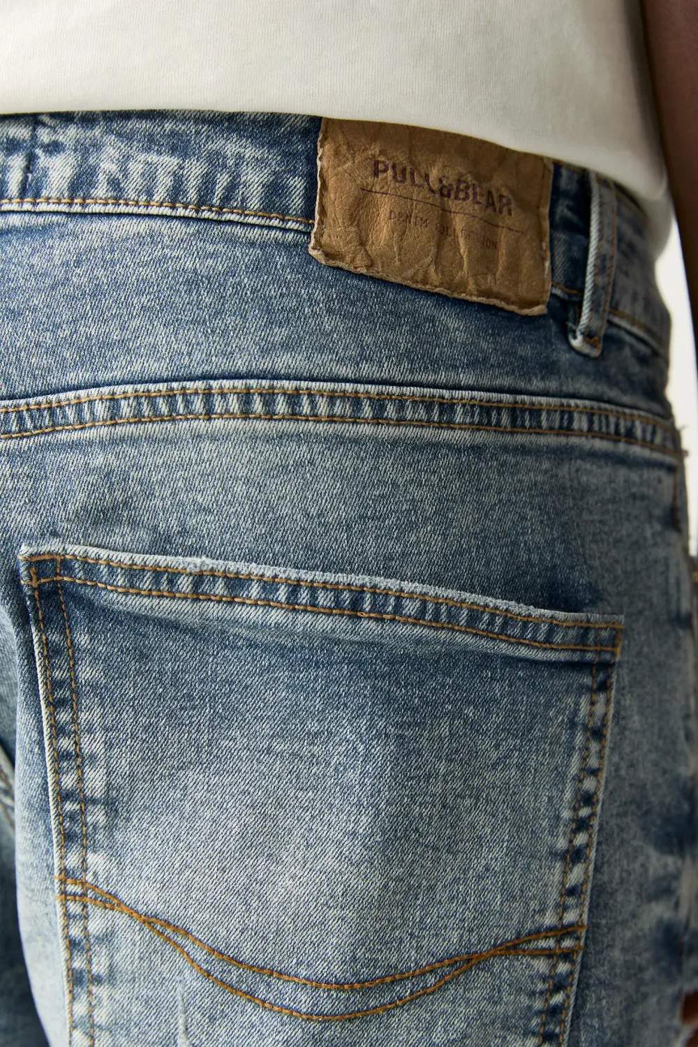Ripped denim Bermuda shorts