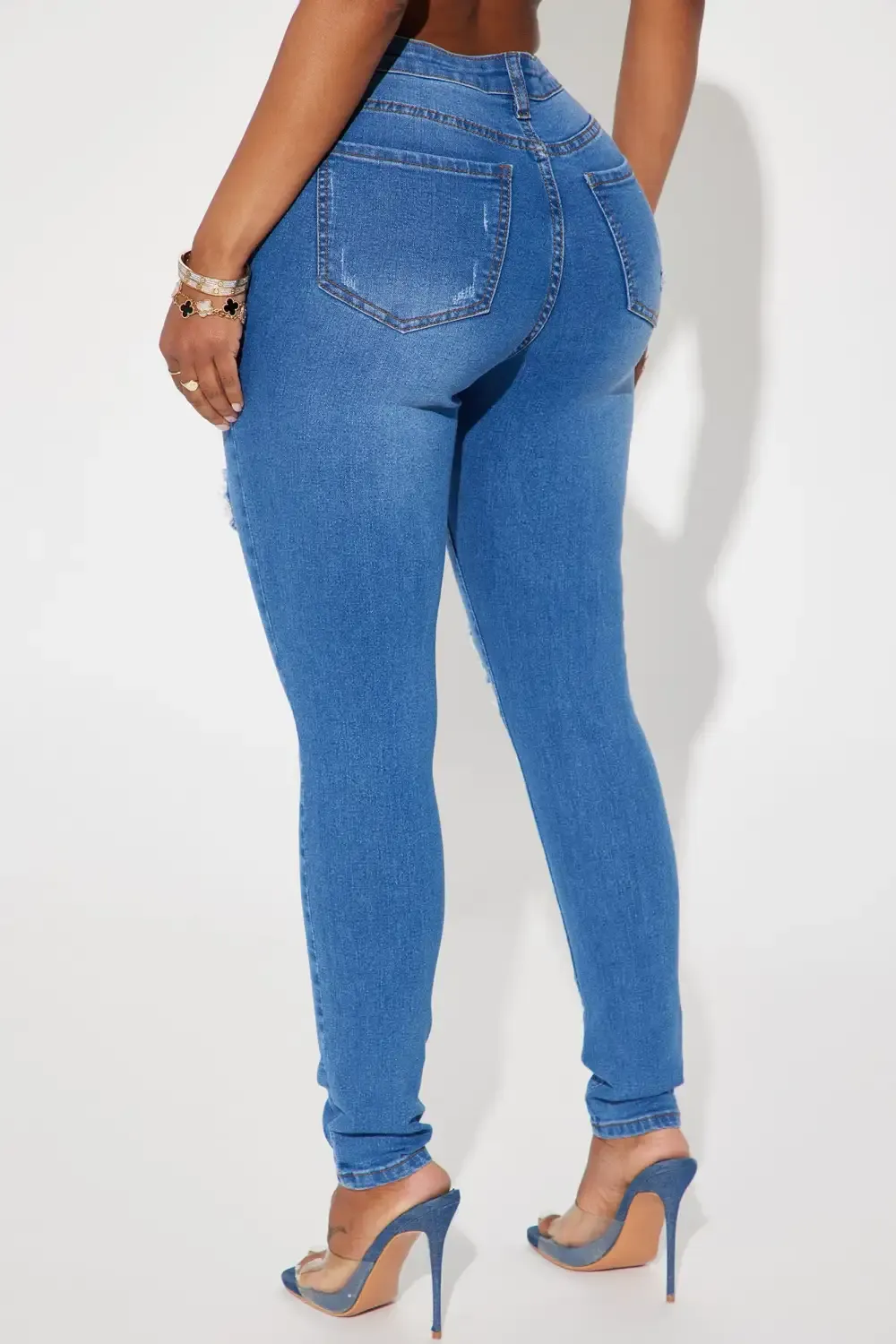 Molly Mid Rise Ripped Stretch Skinny Jeans - Medium Wash