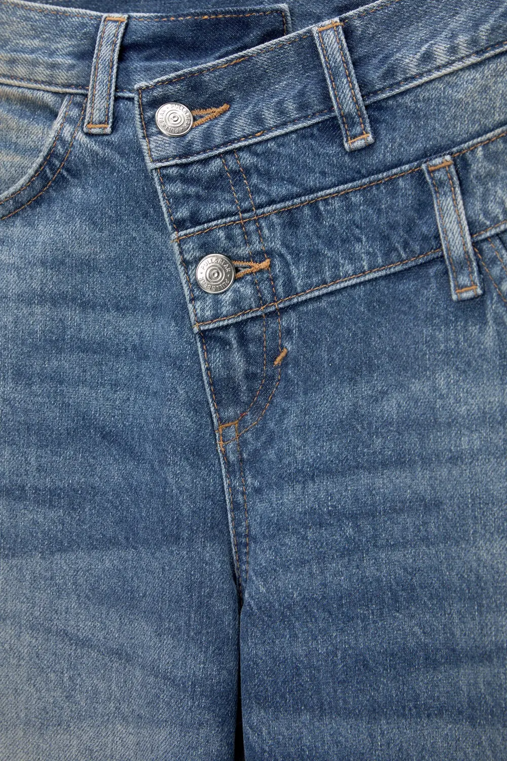 Jeans cintura cruzada