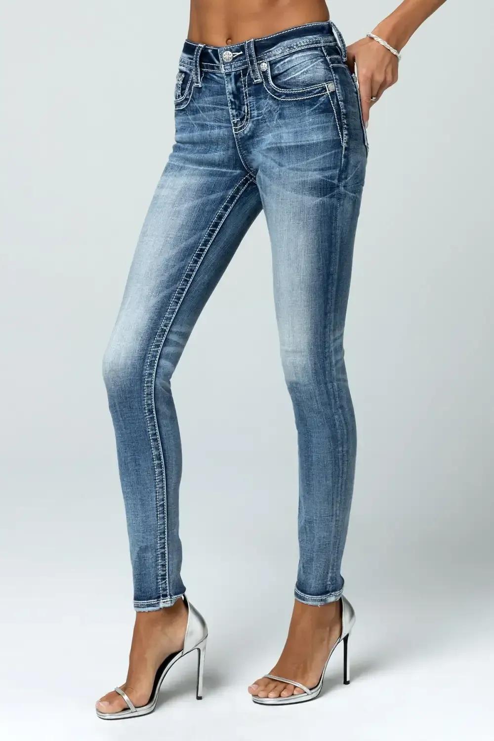 Torn Saddle Stitch Skinny Jeans