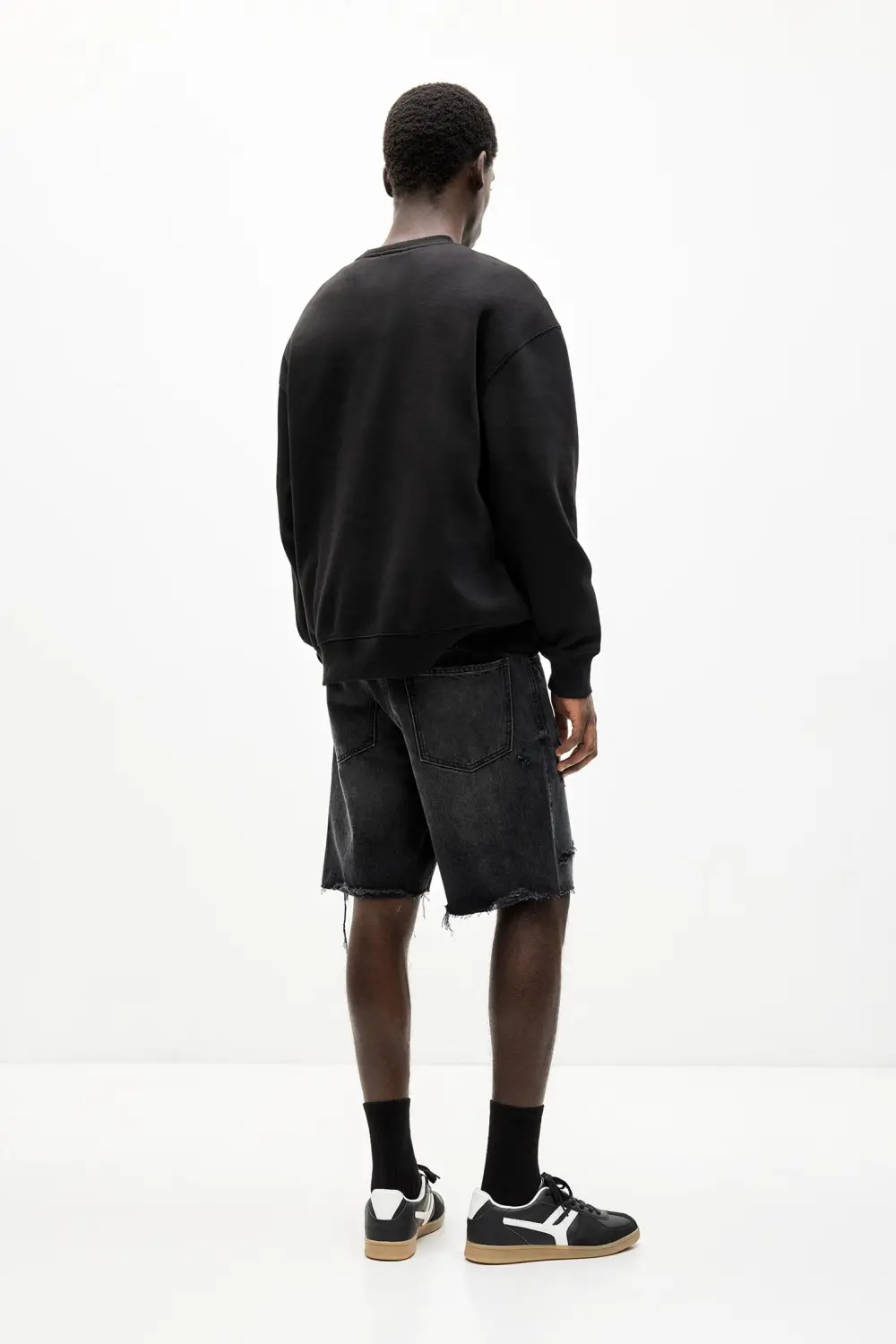 Ripped denim Bermuda shorts
