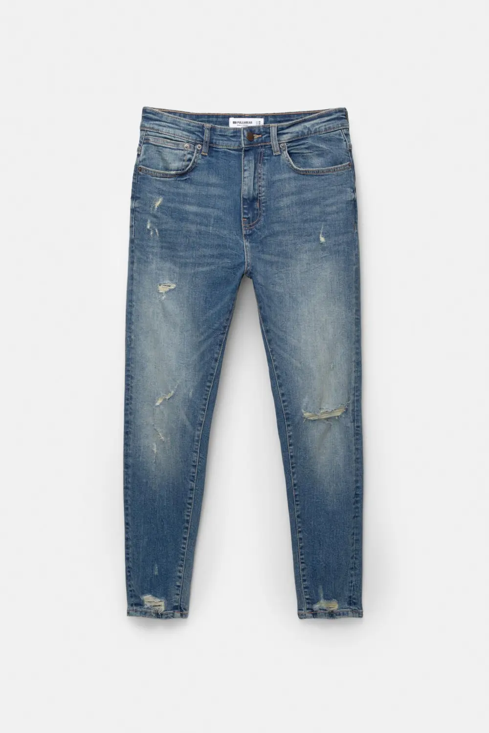 Ripped carrot fit jeans