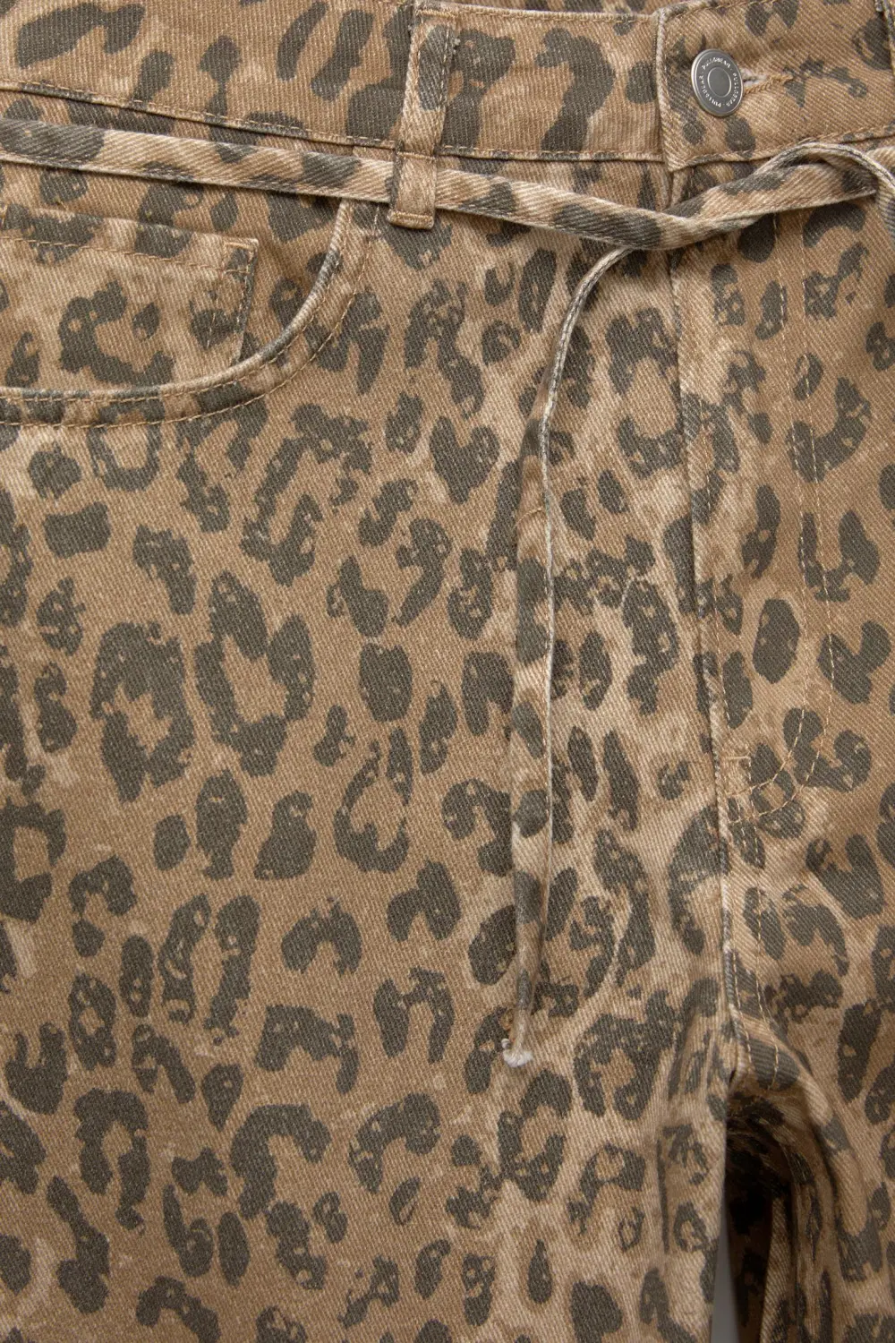 Jeans leopardo cinturón