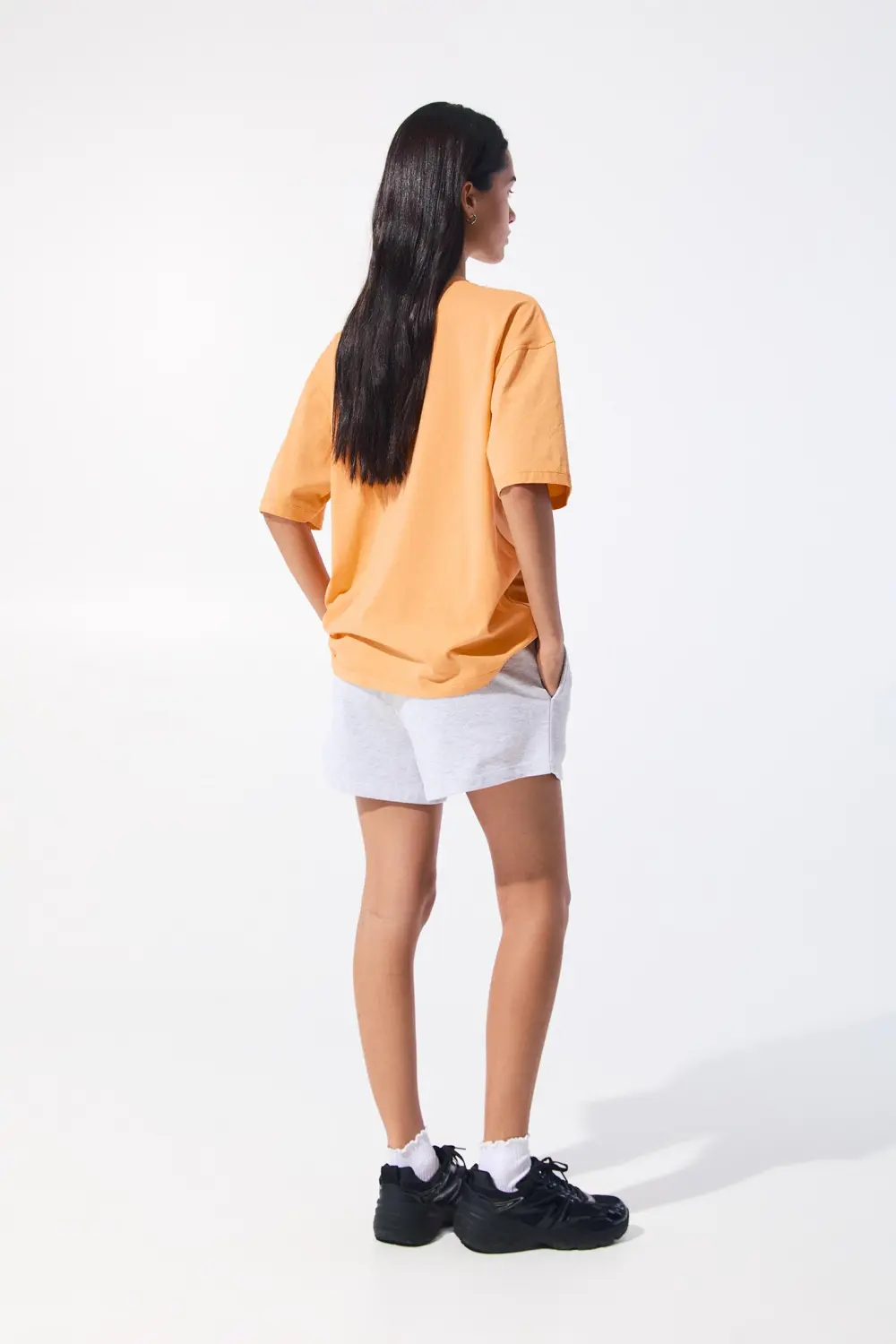 Camiseta naranja texto