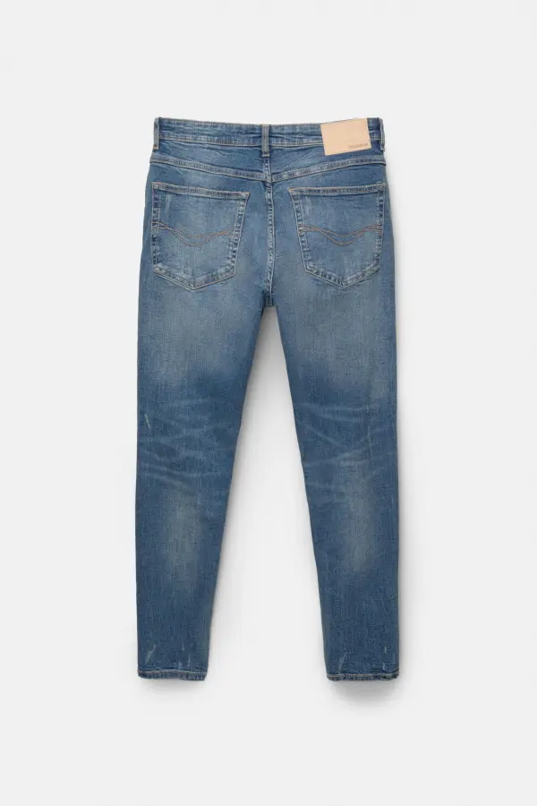 Ripped carrot fit jeans