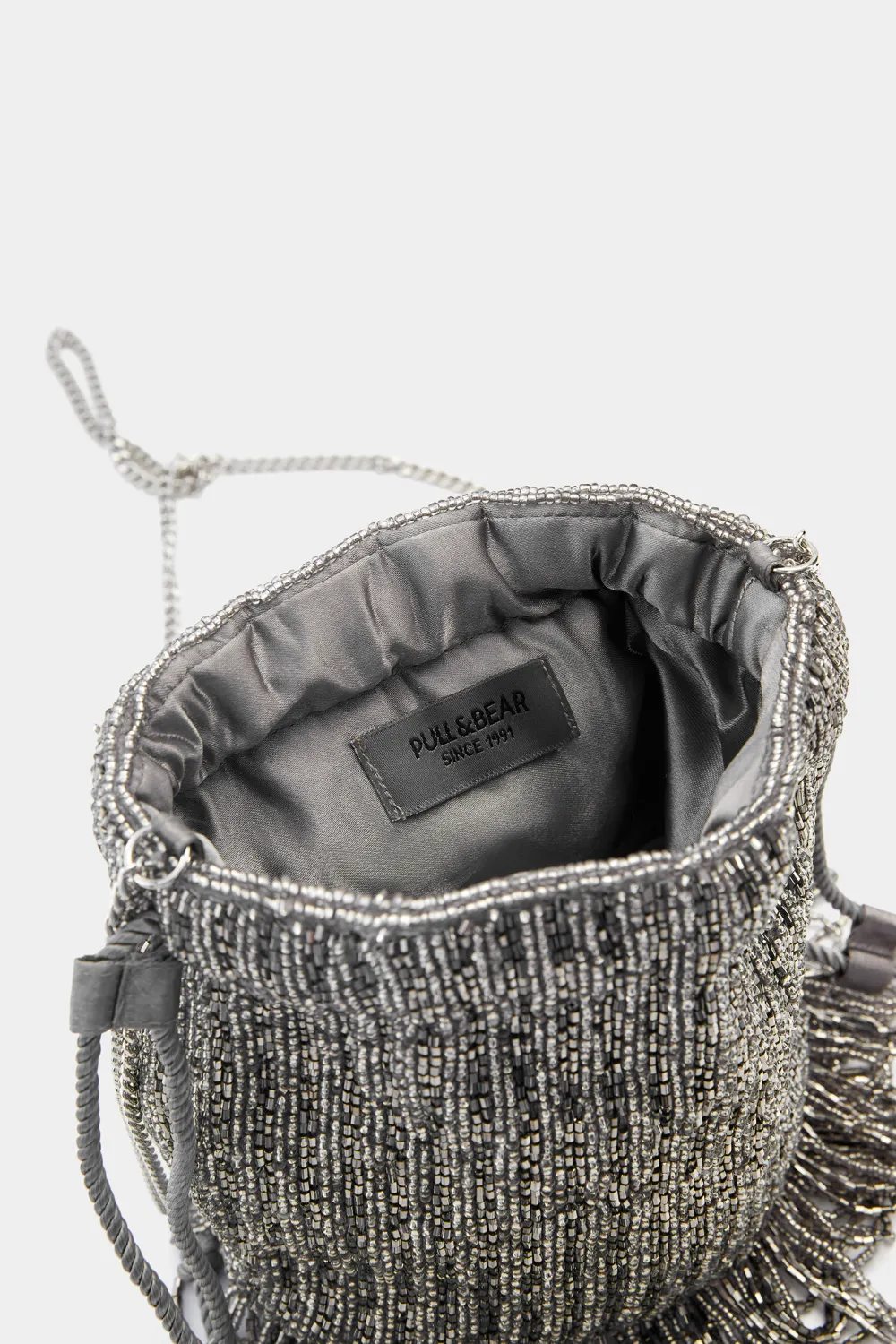 Bolso saca flecos abalorios