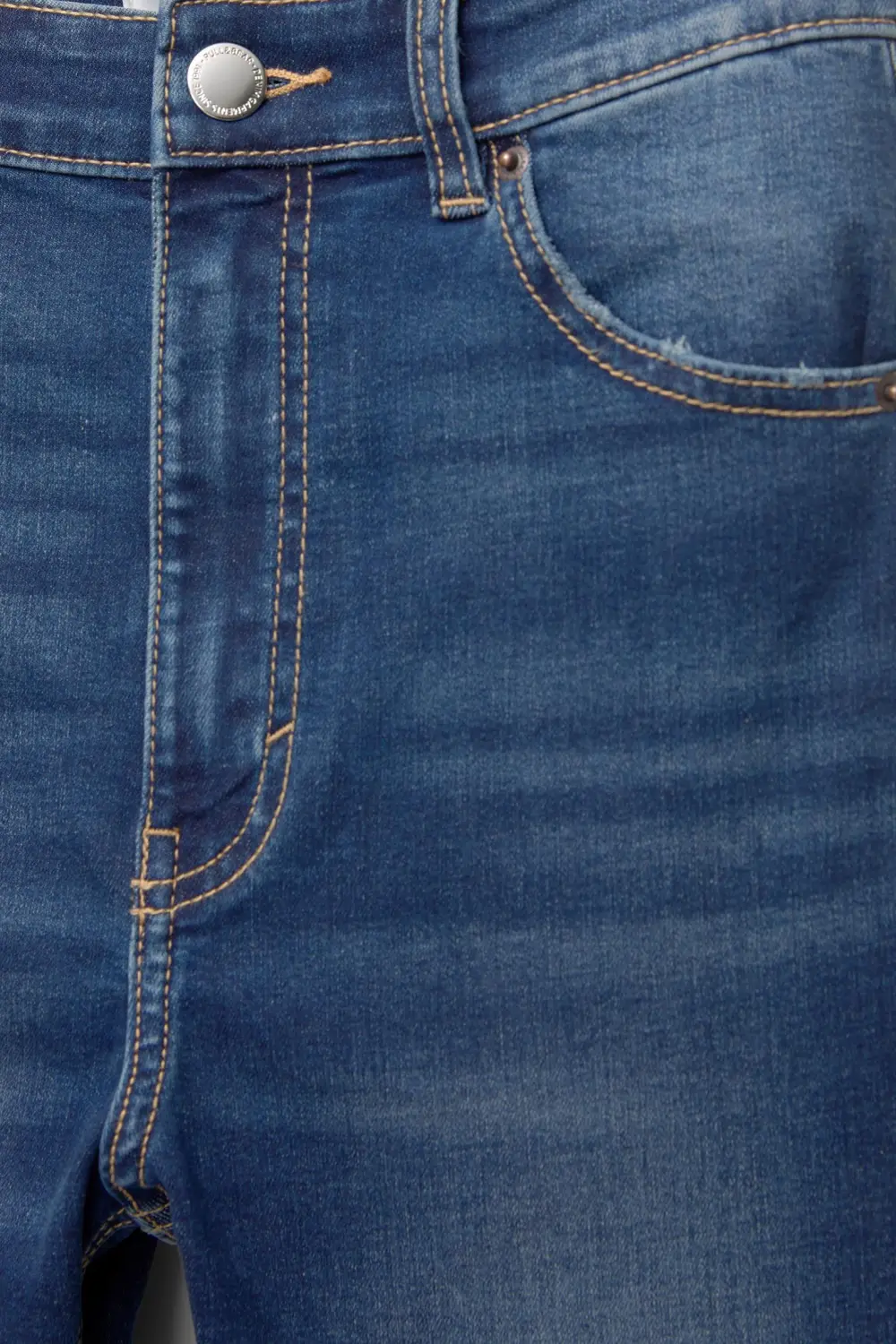 Jeans skinny tiro alto