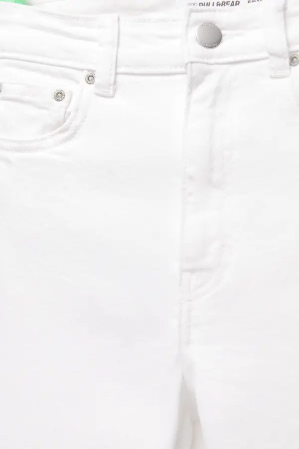 Jeans flare tiro alto
