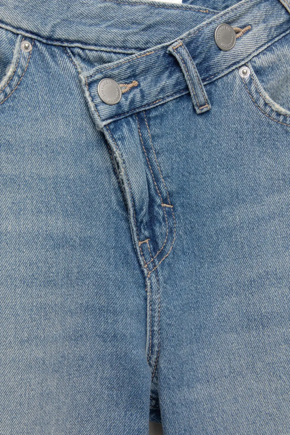 Jeans wide leg cintura cruzada