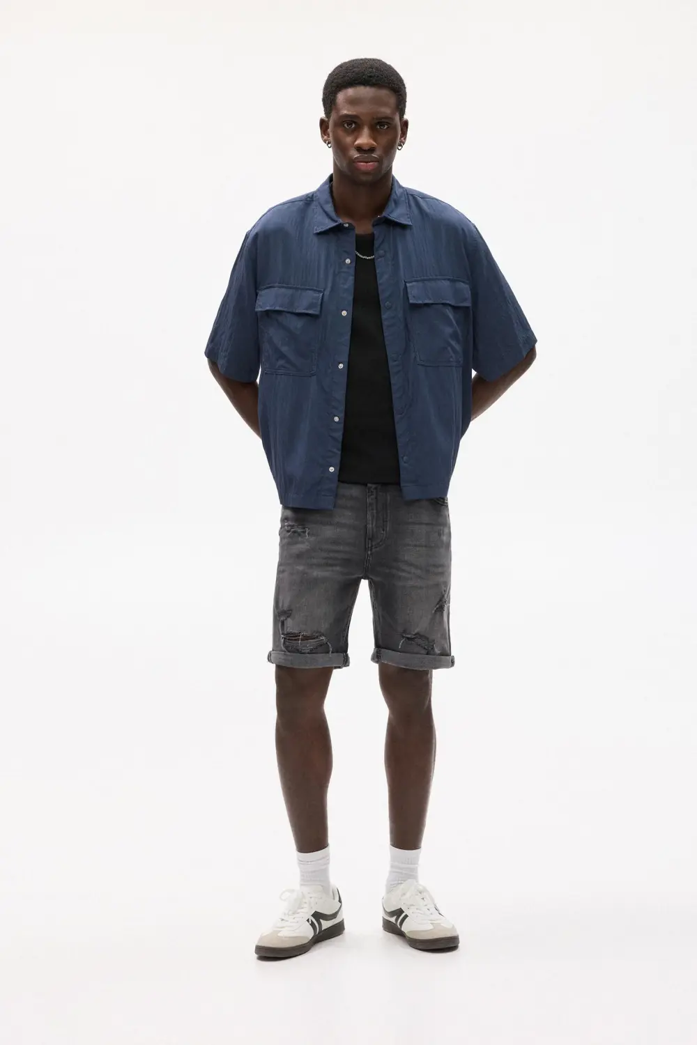Ripped denim Bermuda shorts