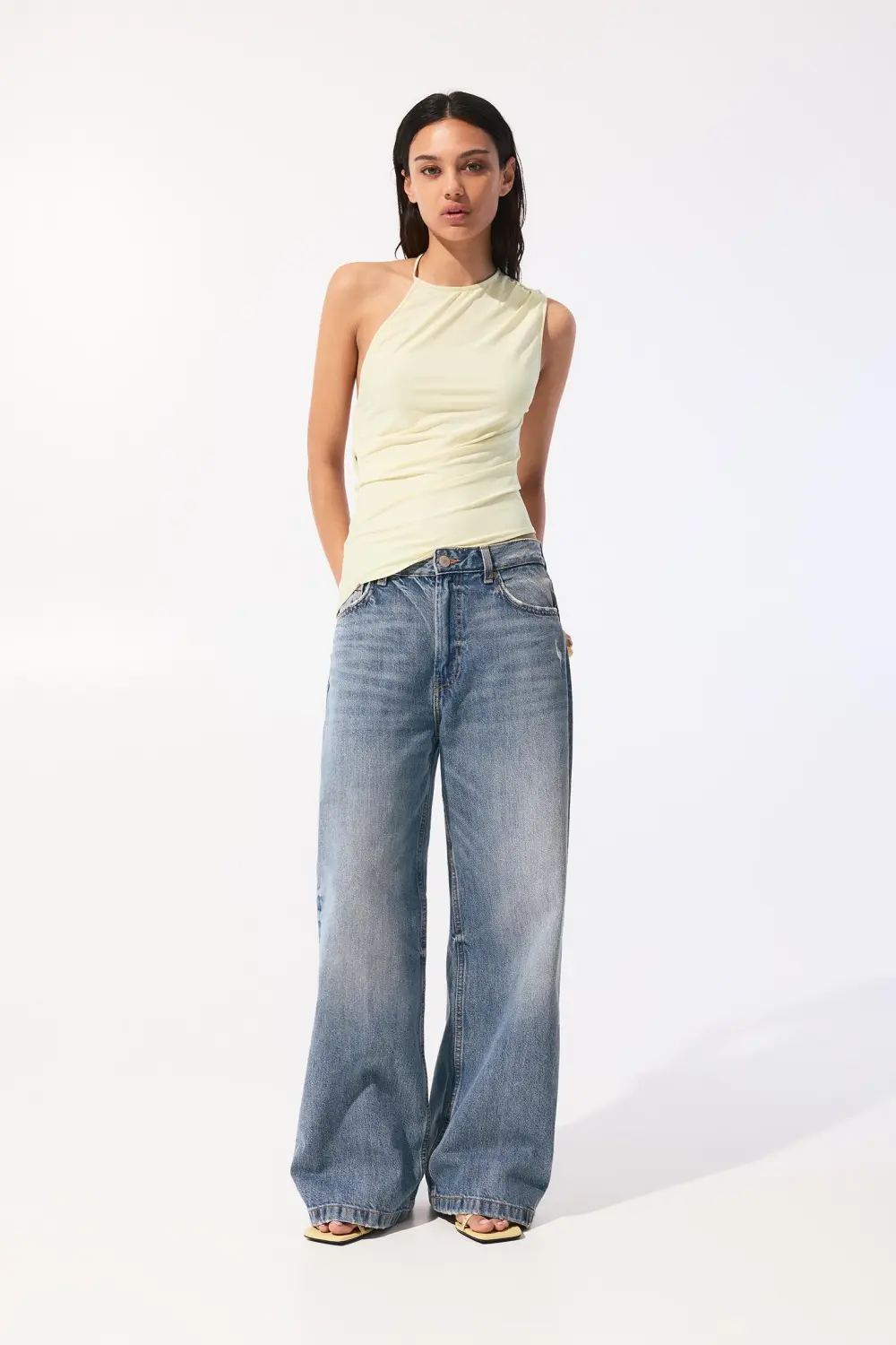 Asymmetric top with strap