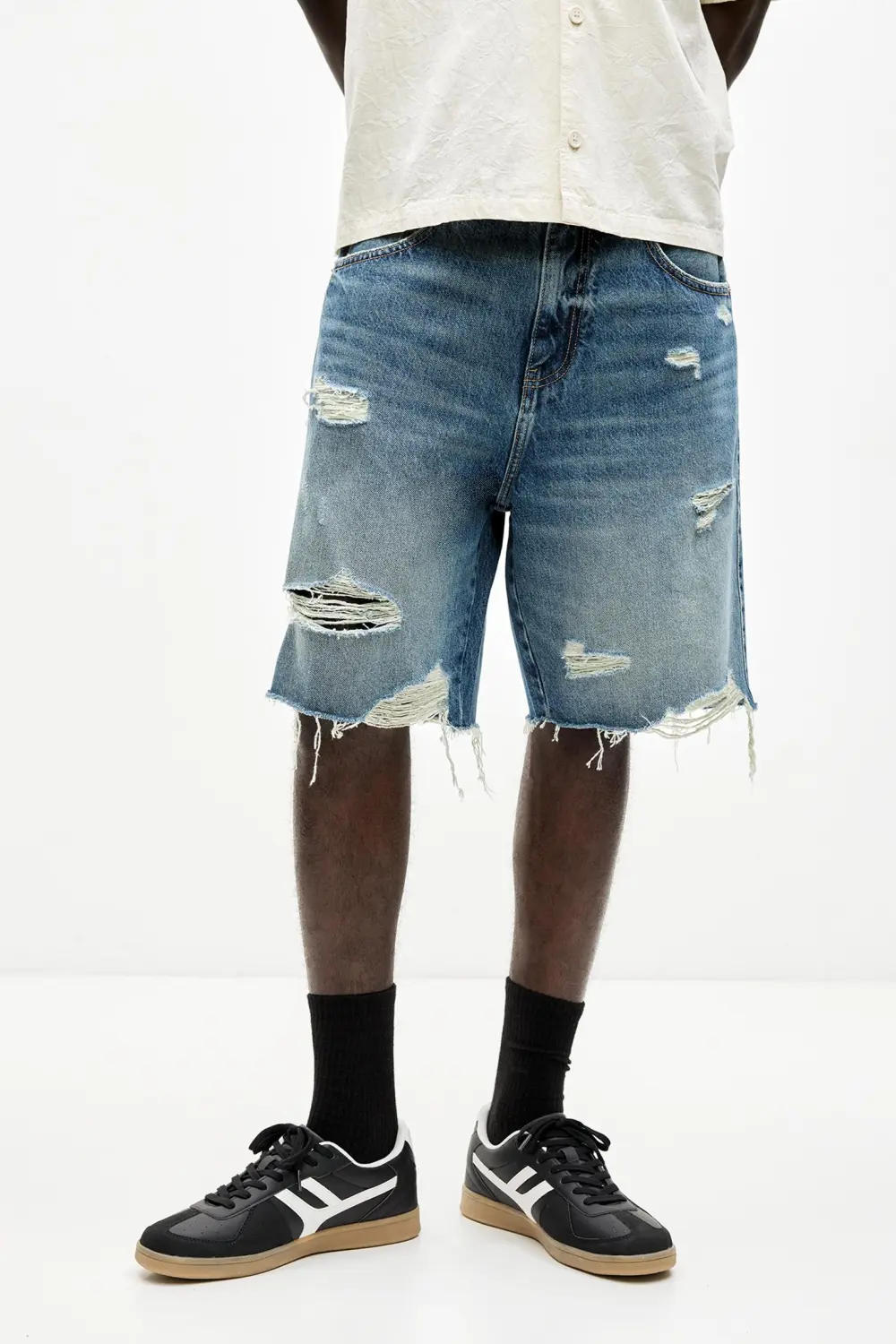 Ripped denim Bermuda shorts