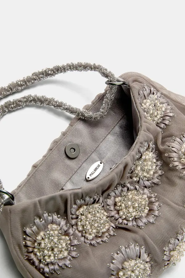 Bolso de hombro flores adornos