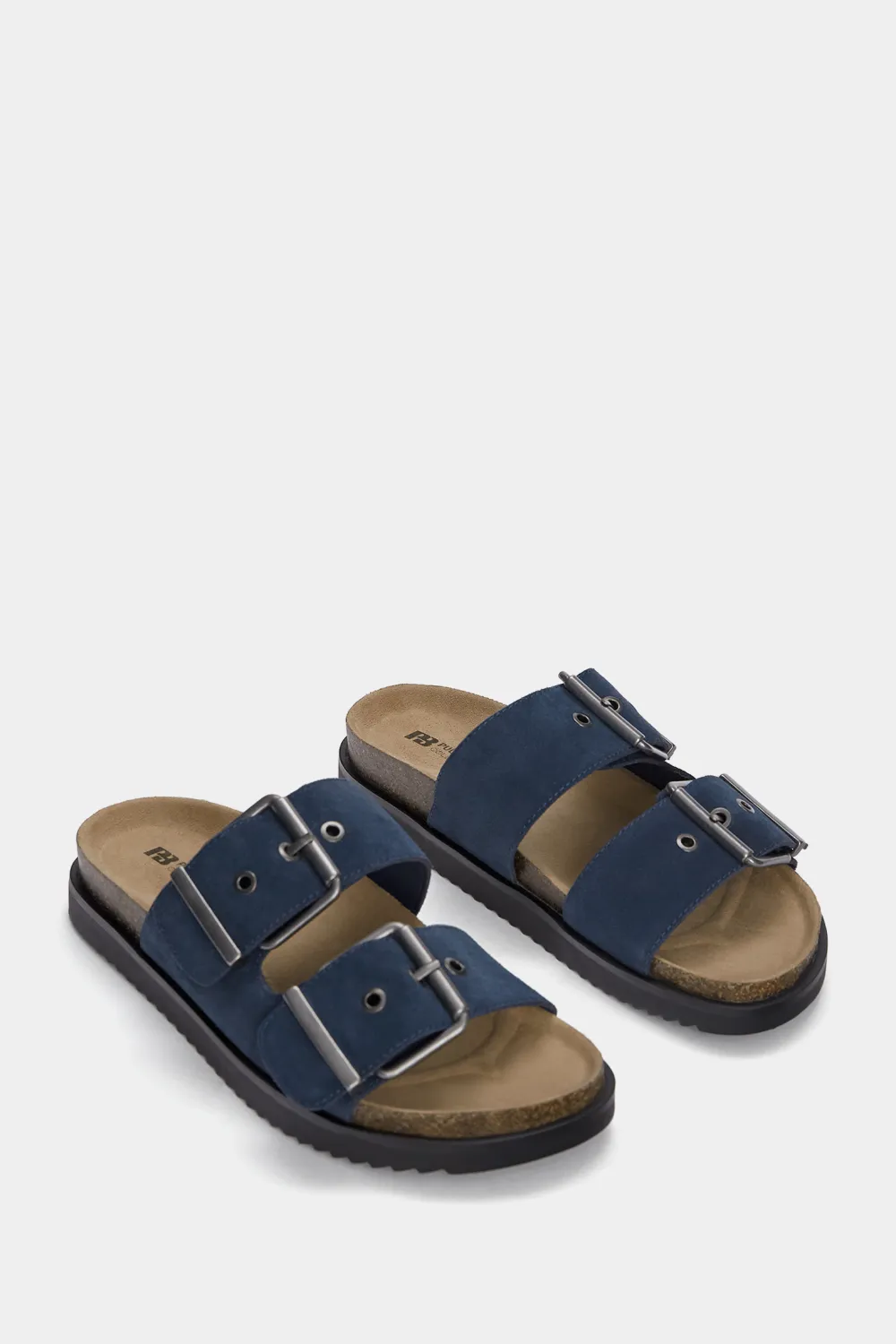 Sandalias planas serraje hebillas
