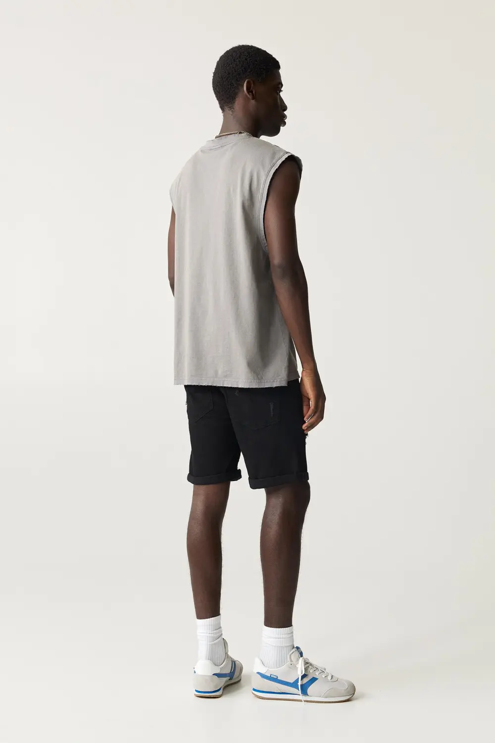Ripped denim Bermuda shorts