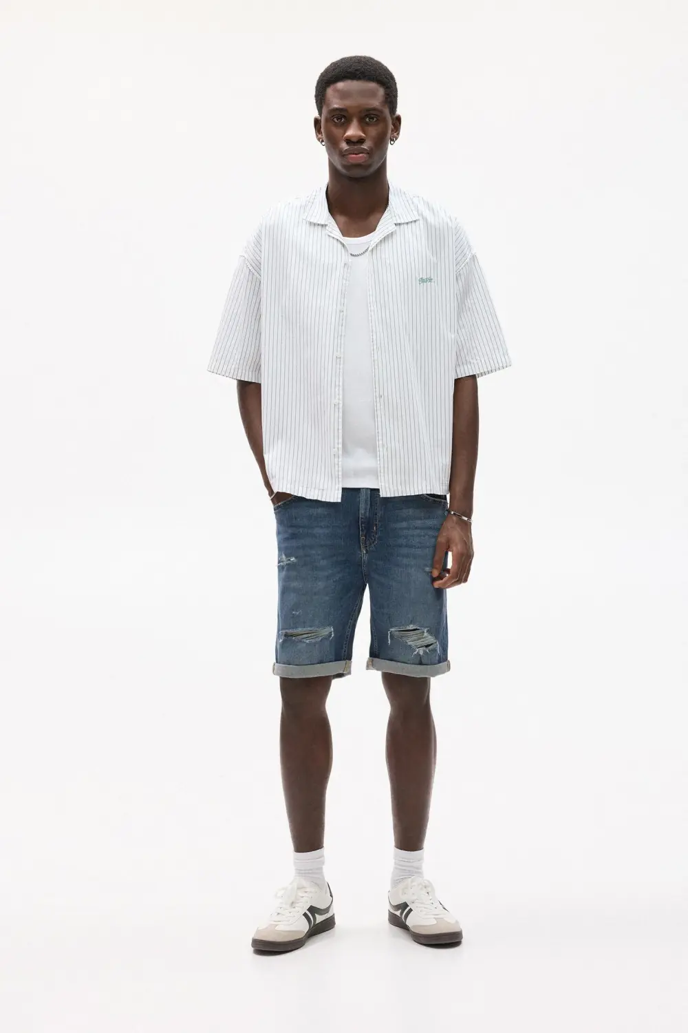 Ripped denim Bermuda shorts