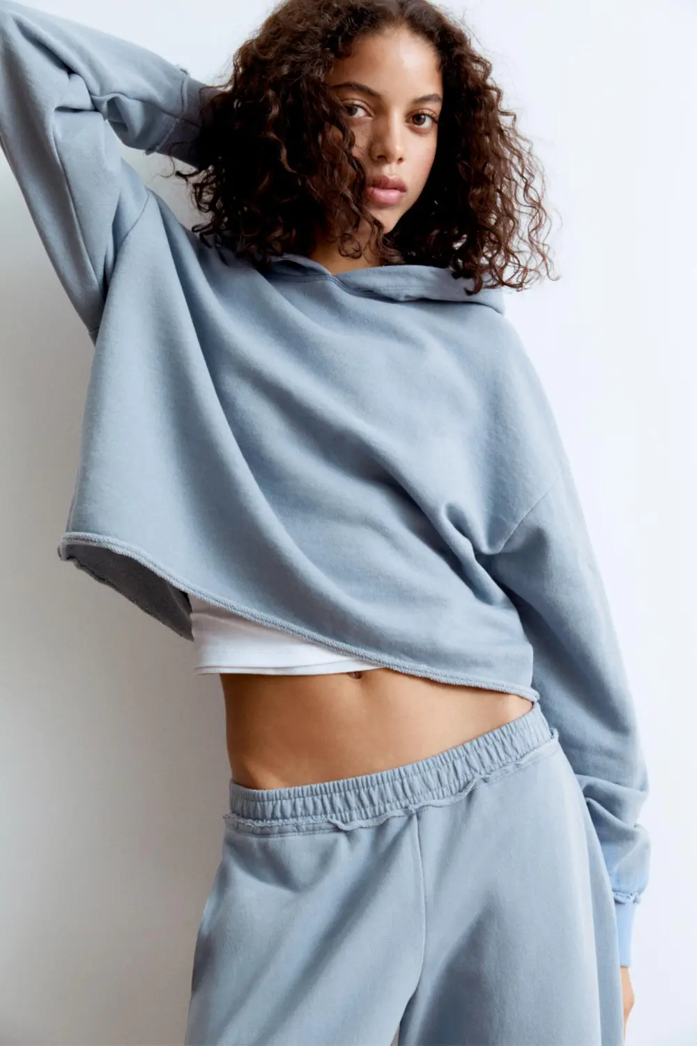 Sudadera boxy bajo desflecado