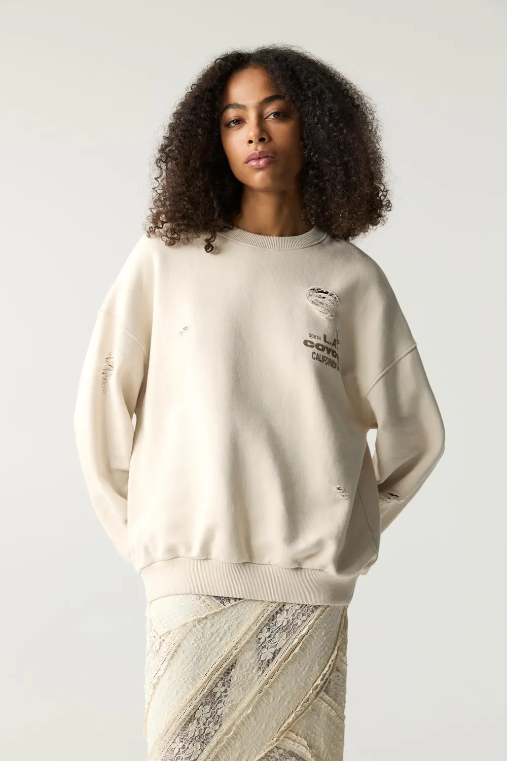 Sudadera motel detalle rotos