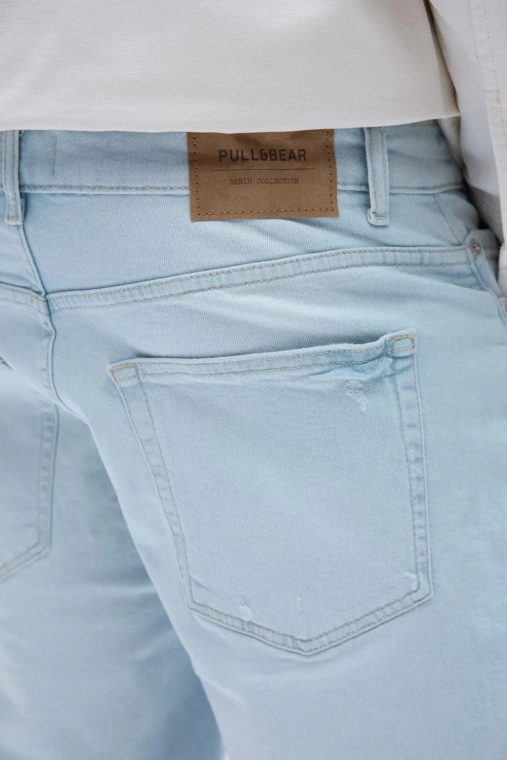 Ripped denim Bermuda shorts