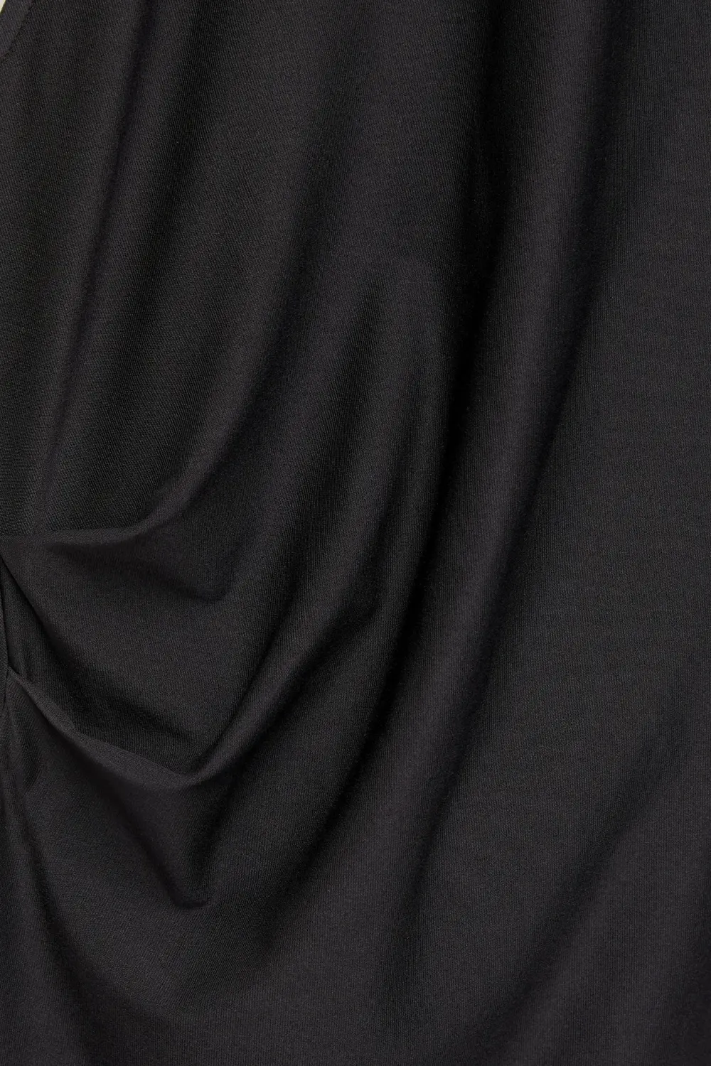 Asymmetric top with strap