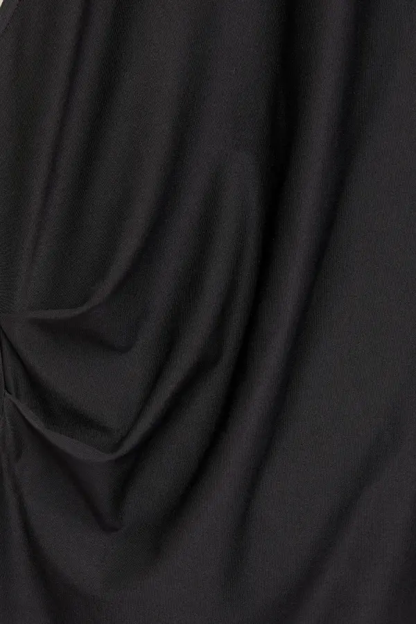 Asymmetric top with strap
