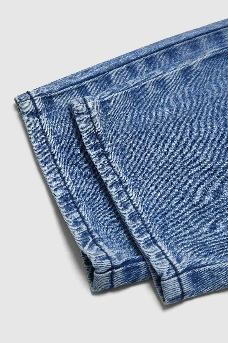 Wash Ripped Mid Rise Barrel Leg Jeans