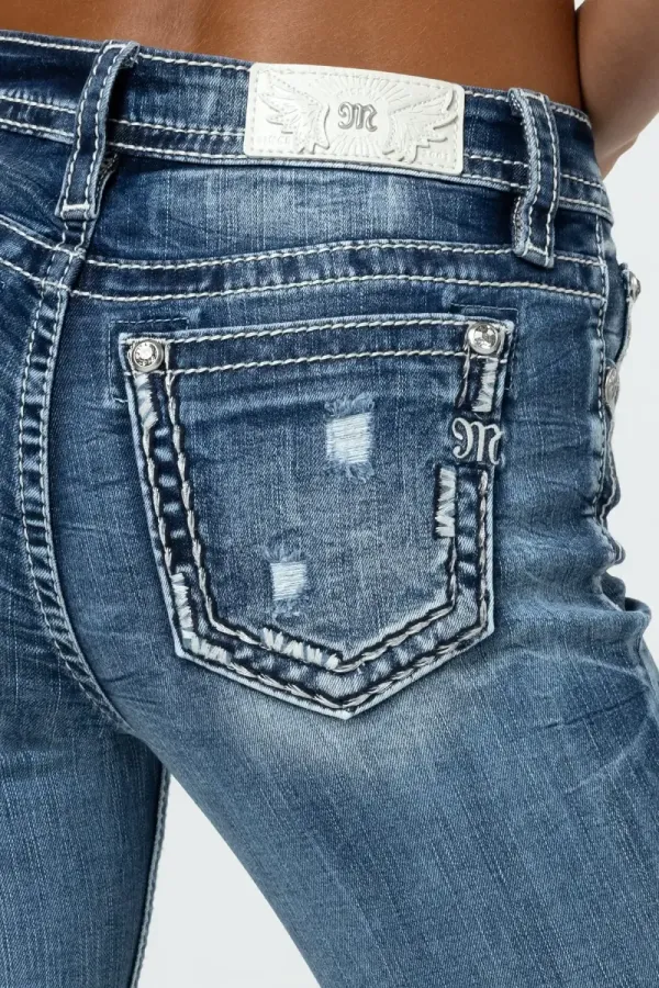Torn Saddle Stitch Skinny Jeans