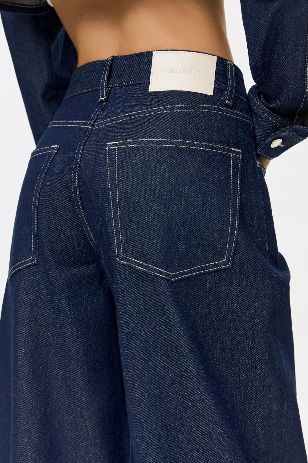 Jeans super wide leg vuelta bajo