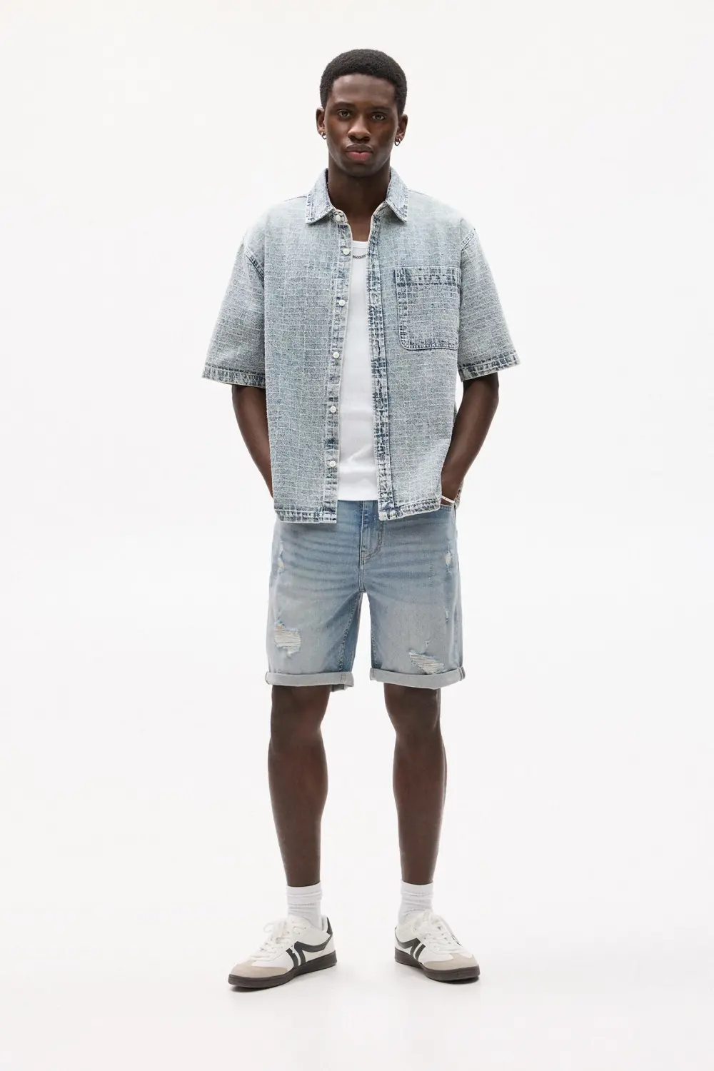 Ripped denim Bermuda shorts