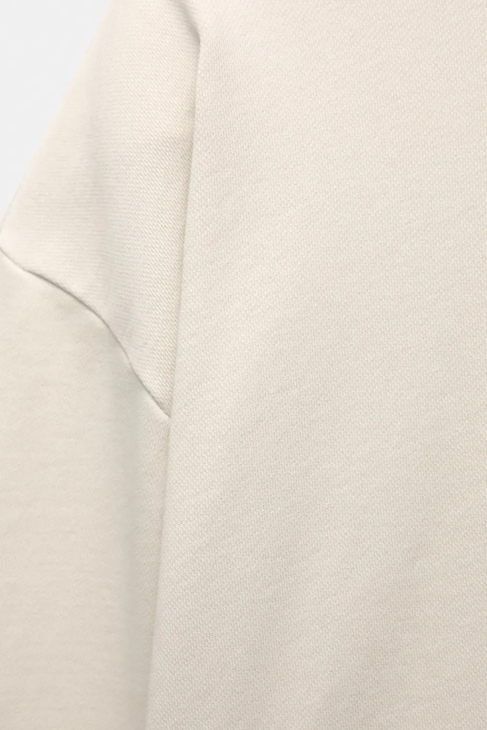 Sudadera boxy bajo desflecado