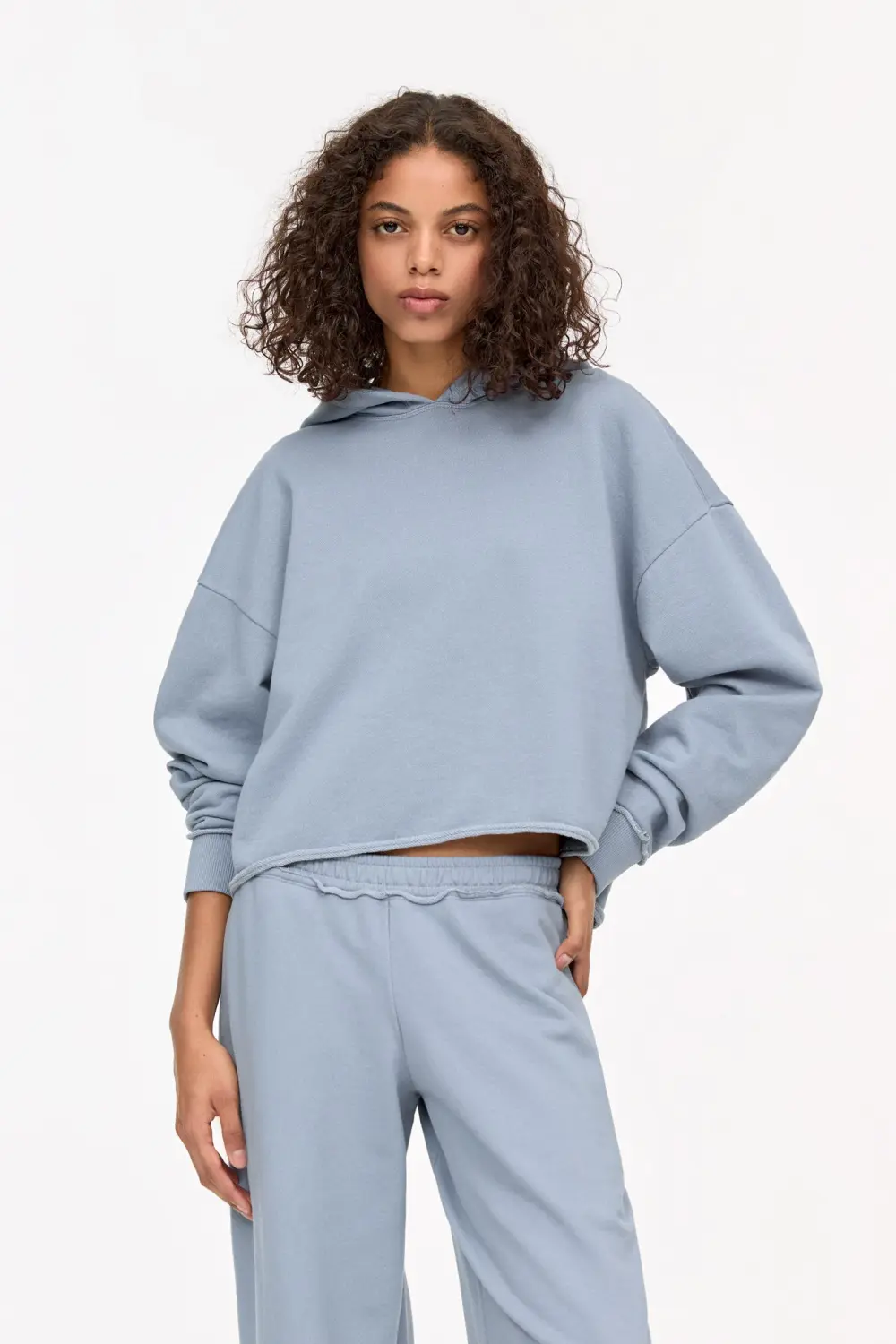 Sudadera boxy bajo desflecado