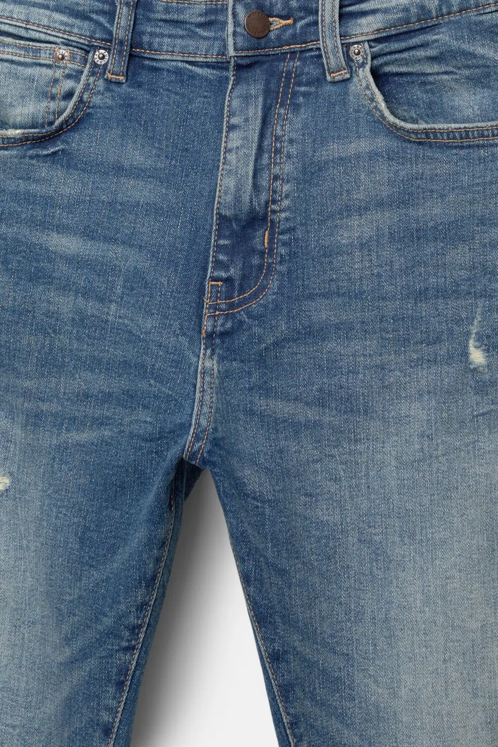 Ripped carrot fit jeans