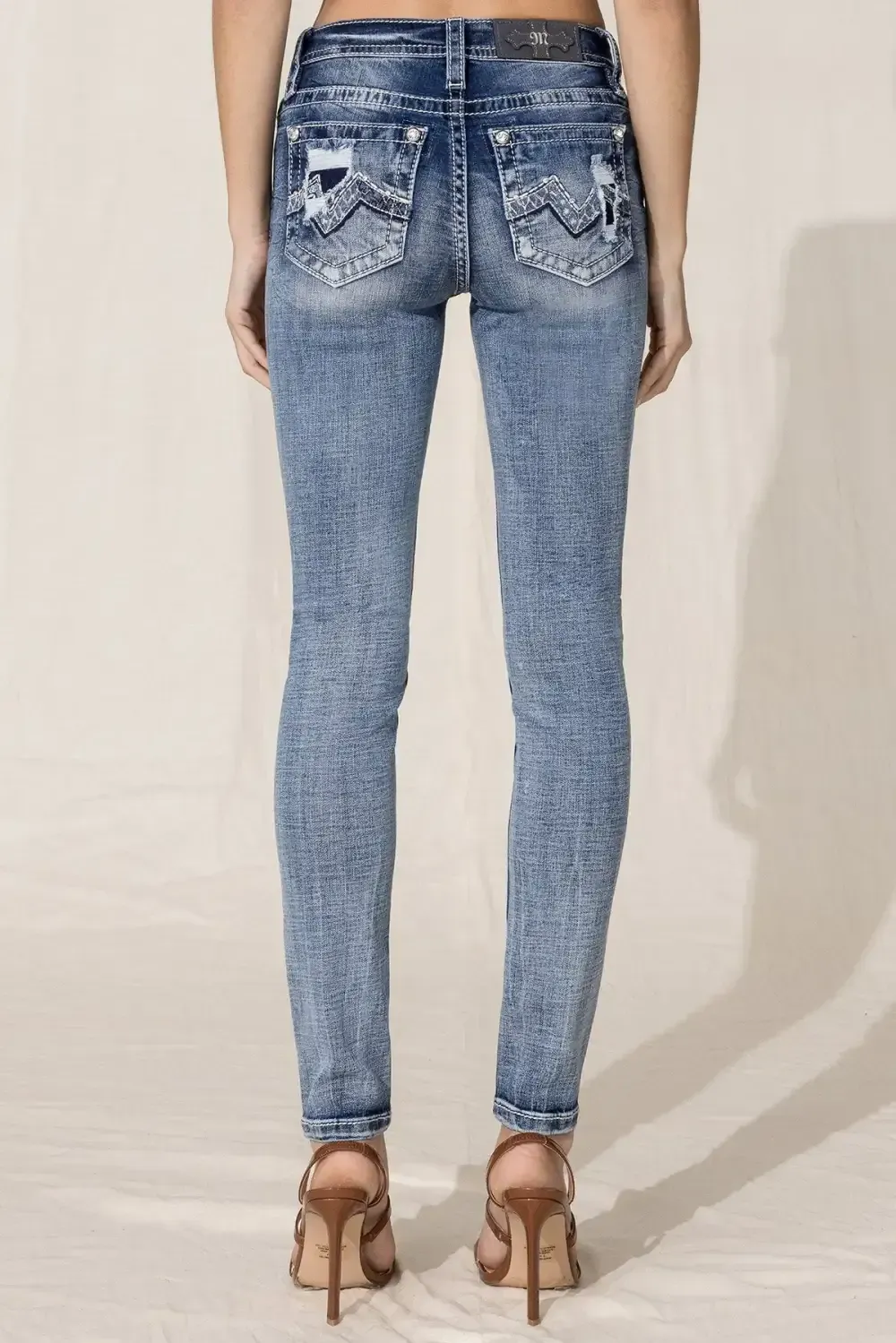 Modern Blowout Logo Skinny Jeans