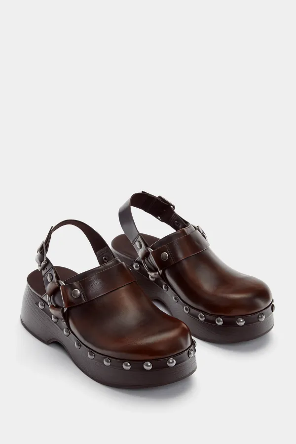 Zuecos tachas