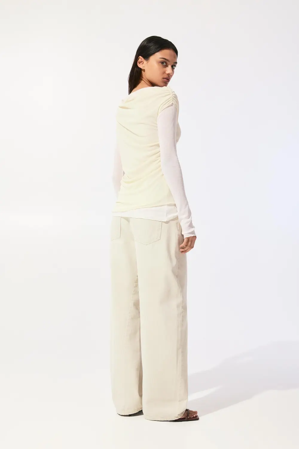 Semi-sheer asymmetric double-layer top