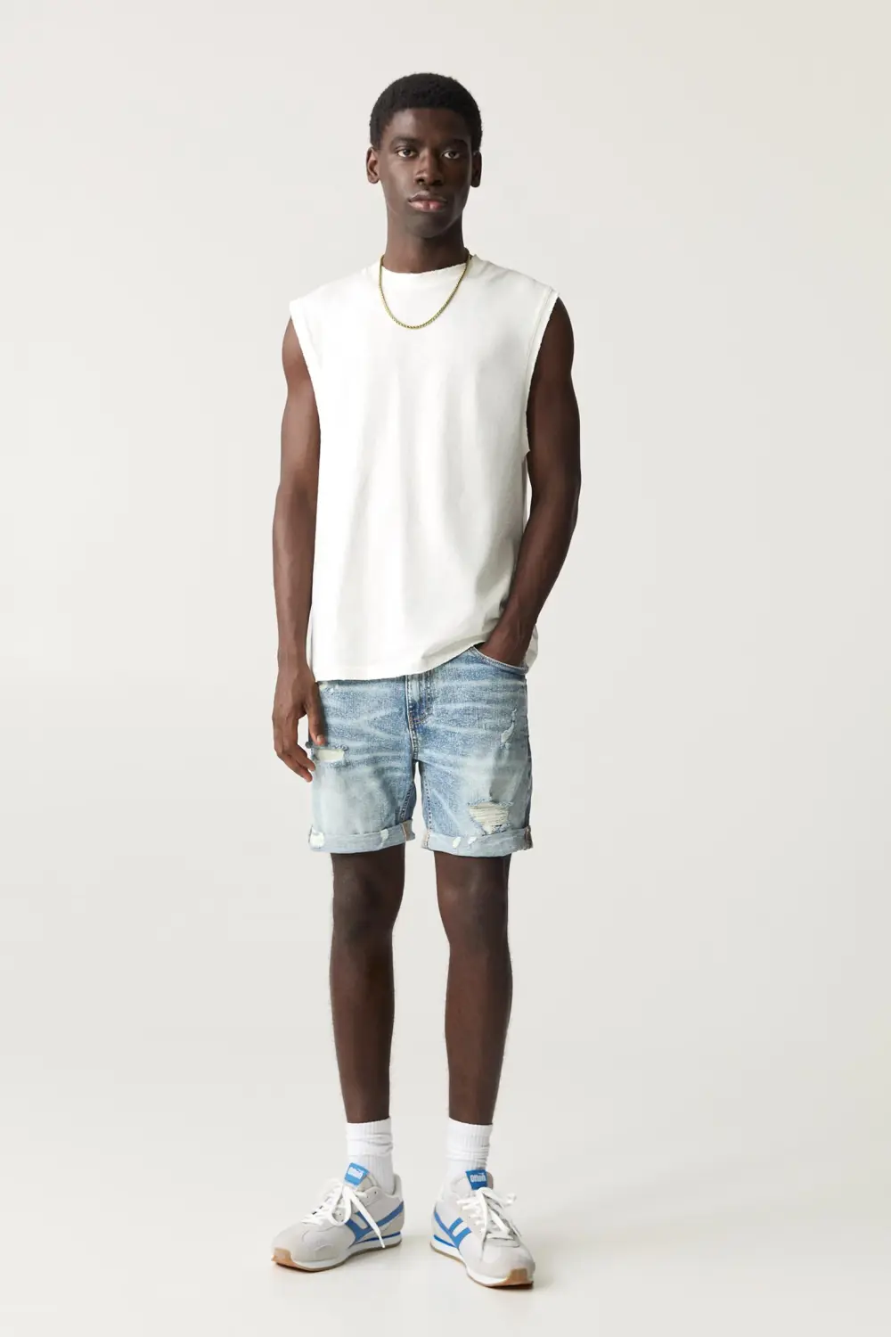 Ripped denim Bermuda shorts
