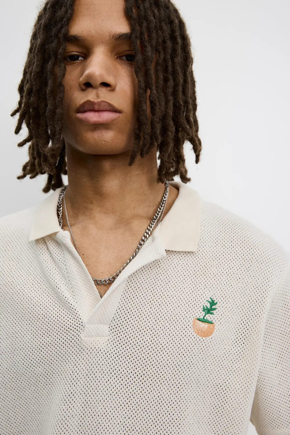Semi-sheer fabric graphic polo shirt