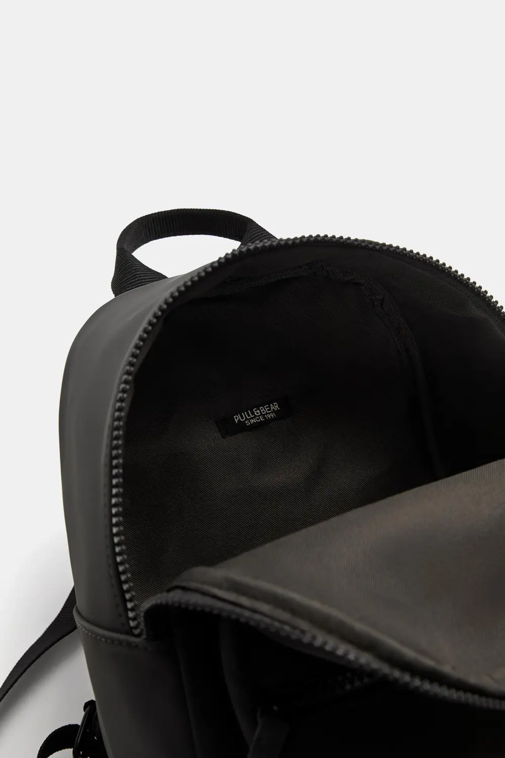 Mini mochila engomada