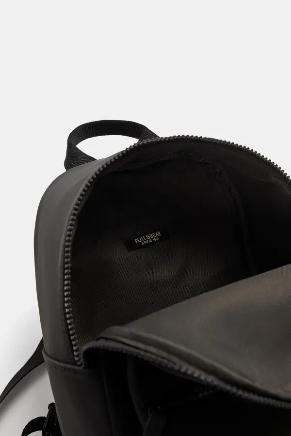 Mini mochila engomada